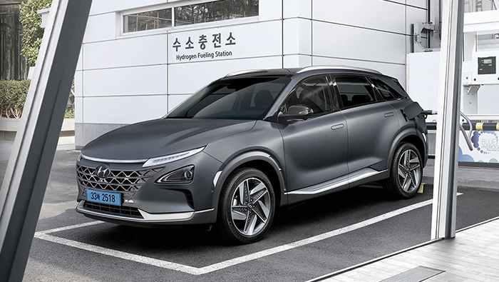 Hyundai NEXO is charging fuel at a hydrogen refueling station