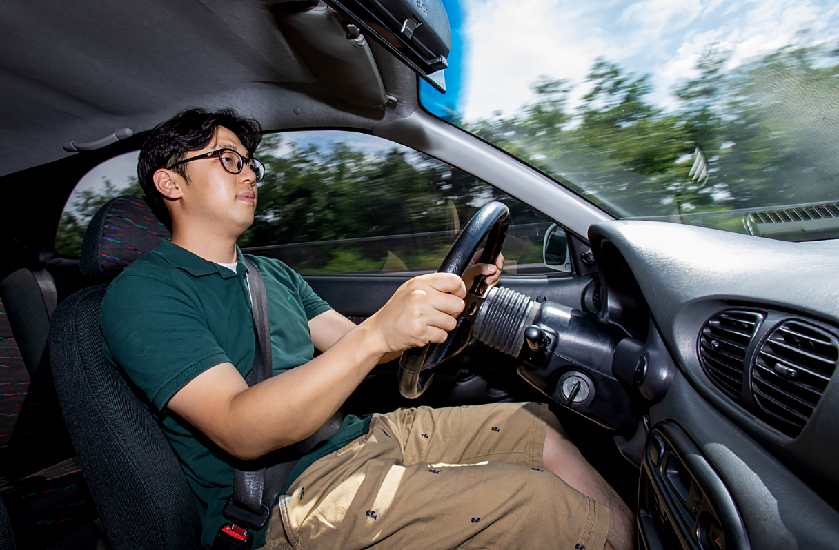 A view of a driver driving his Pro Accent