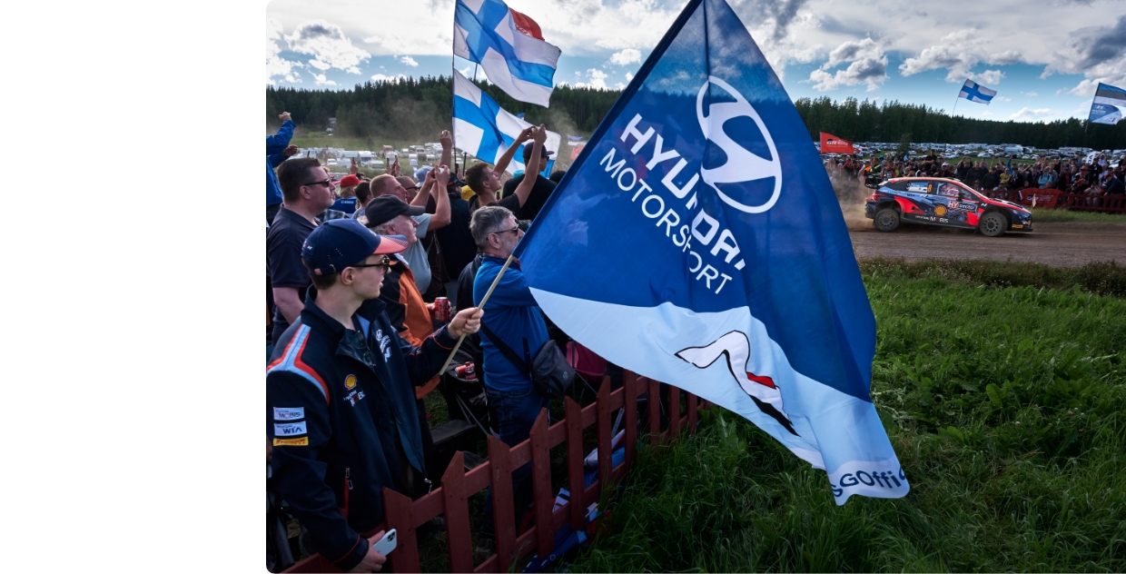 Hyundai rally car is racing along the rally course
