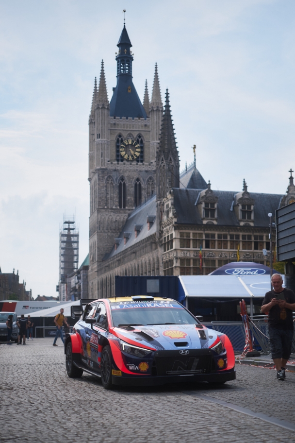 i20 N Rally 1 with Belgian city center behind it