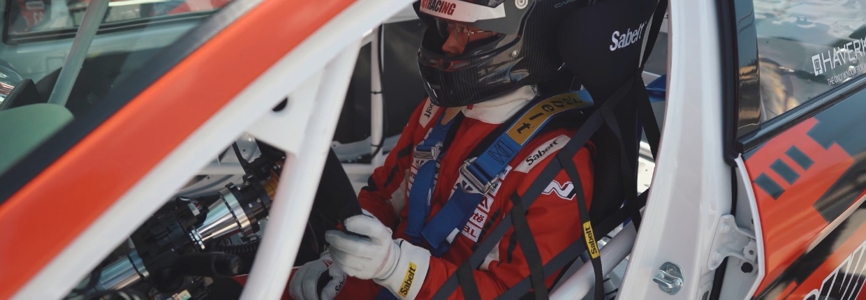 Young-chan Kim in a race car