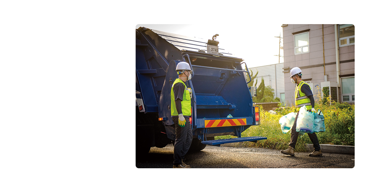 sanitation worker working on garbage collection