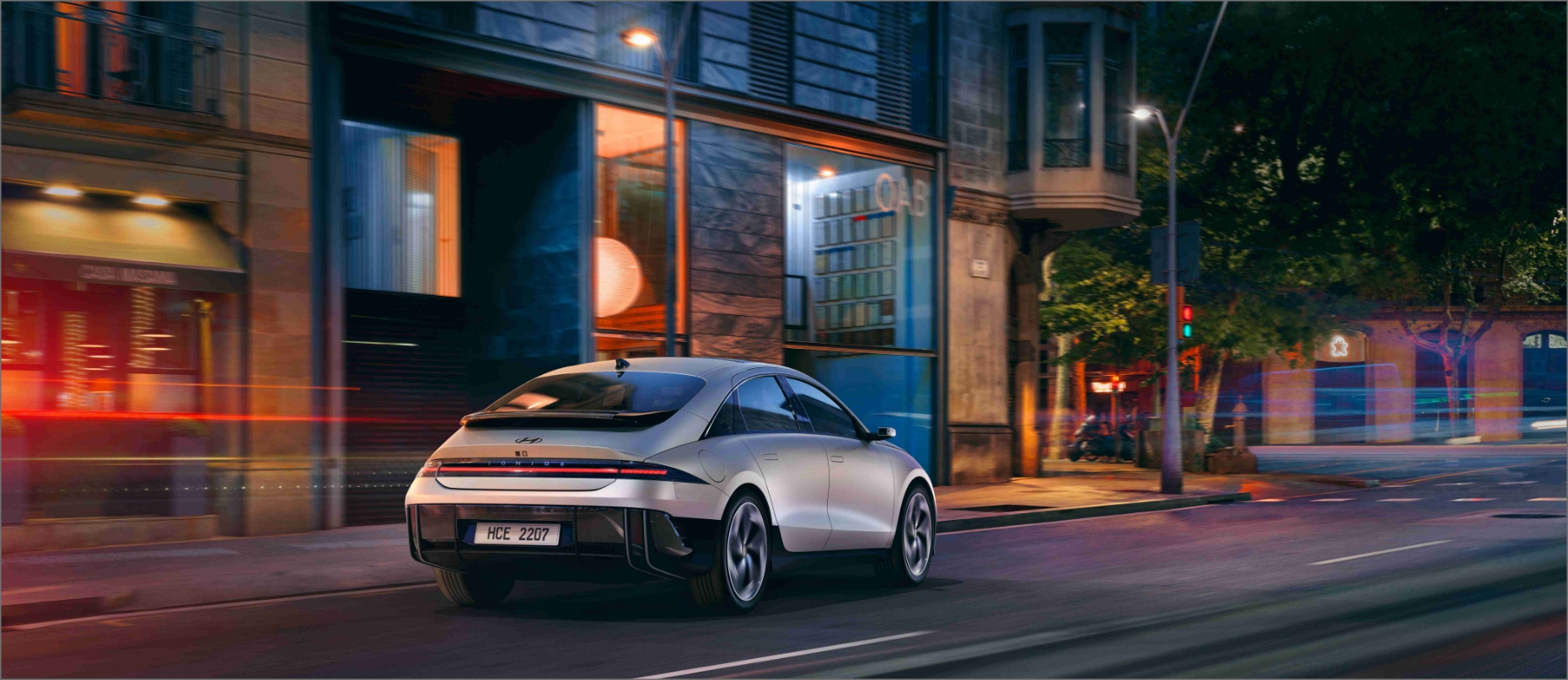 IONIQ 6 driving downtown