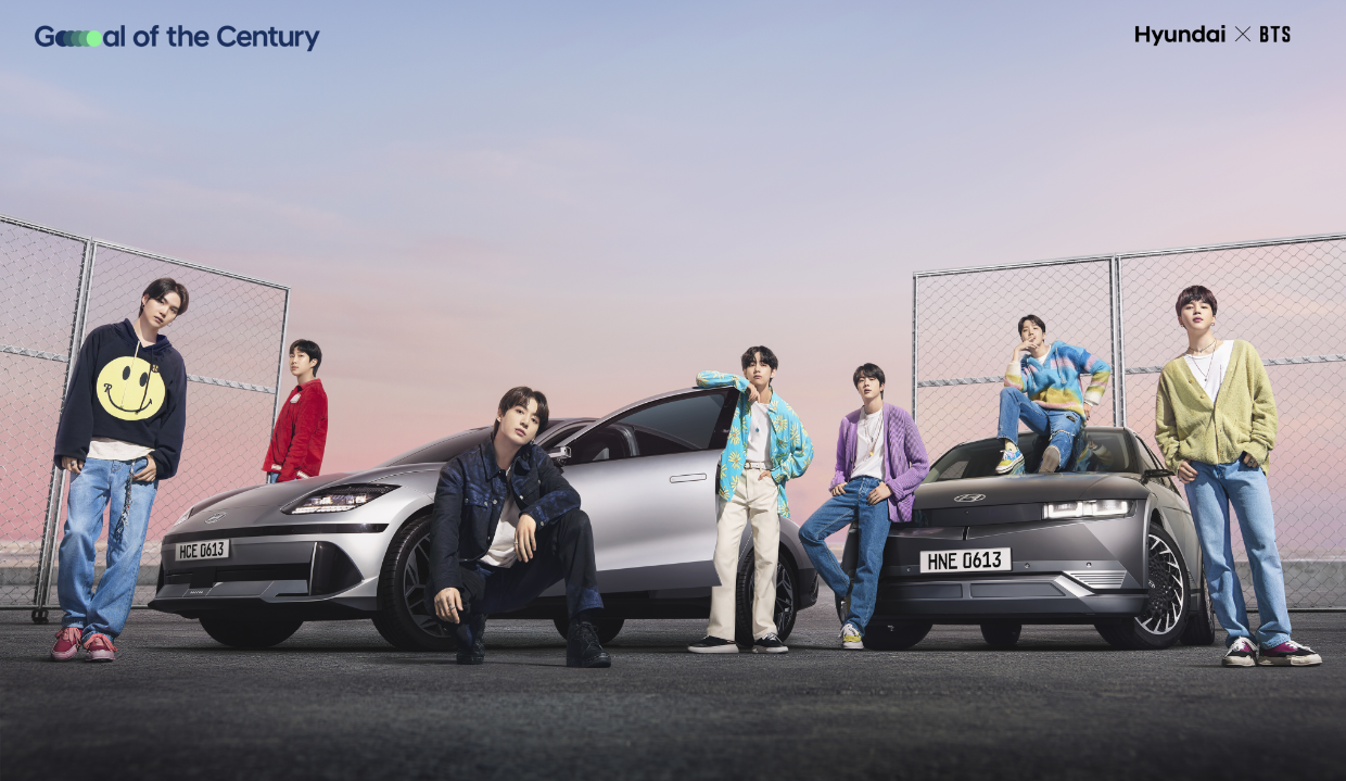 BTS posing in front of IONIQ 5 and IONIQ 6