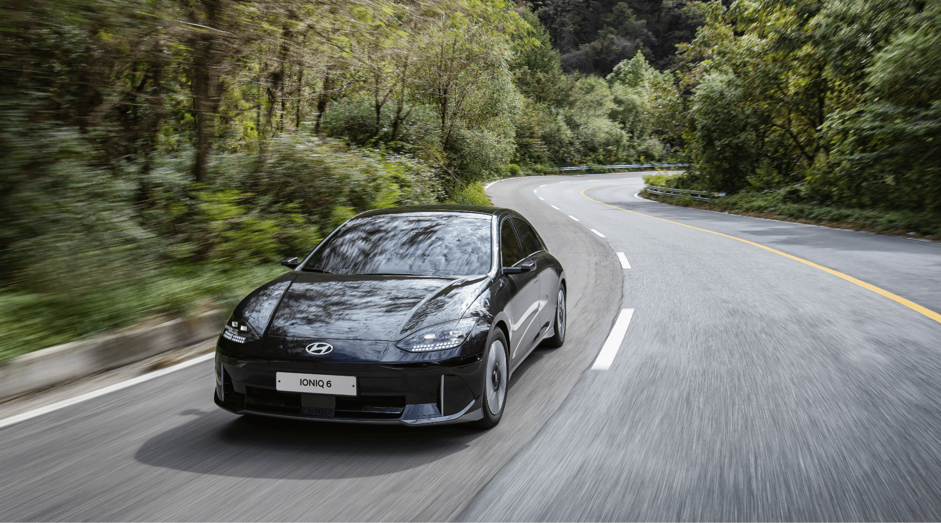Front view of Hyundai IONIQ 6 in motion