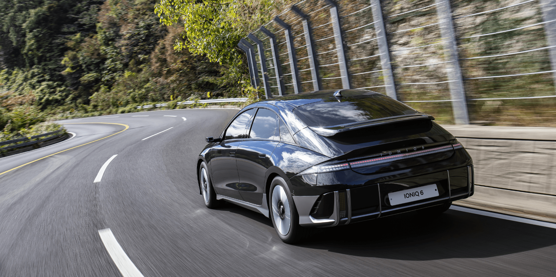 Hyundai IONIQ 6 rear view in motion