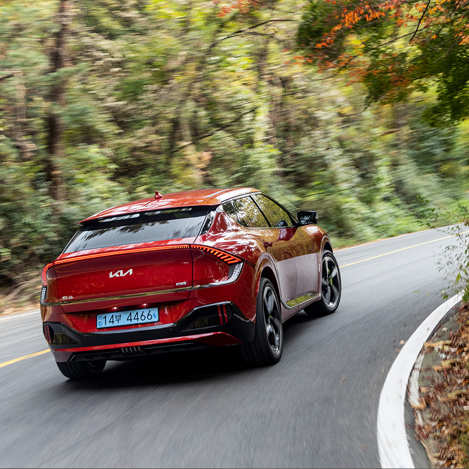 EV6 GT driving down a winding road
