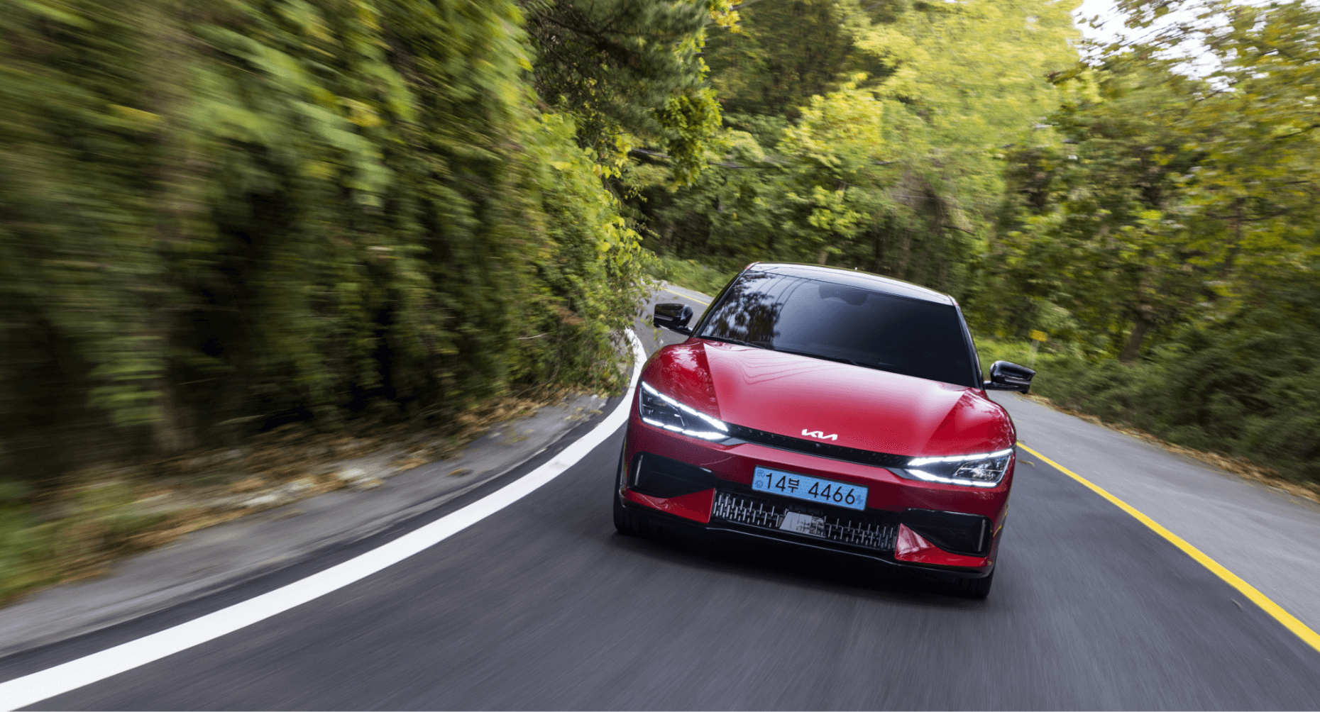 EV6 GT driving down a winding road