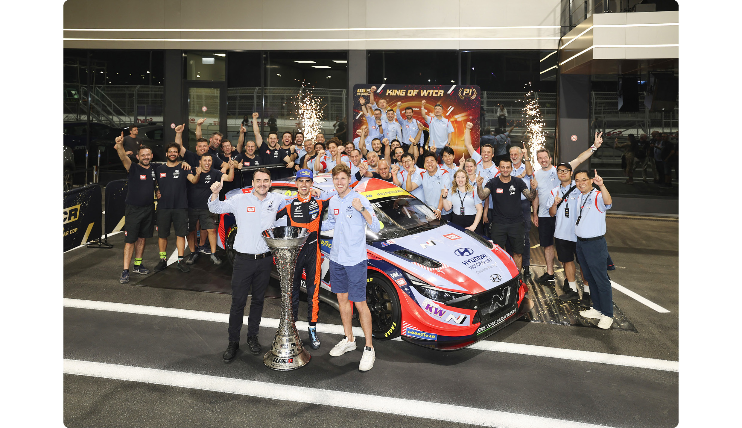 The Hyundai BRC Racing Team cheering right after winning the championship in both the driver’s and the manufacturer’s categories at the 2022 WTCR