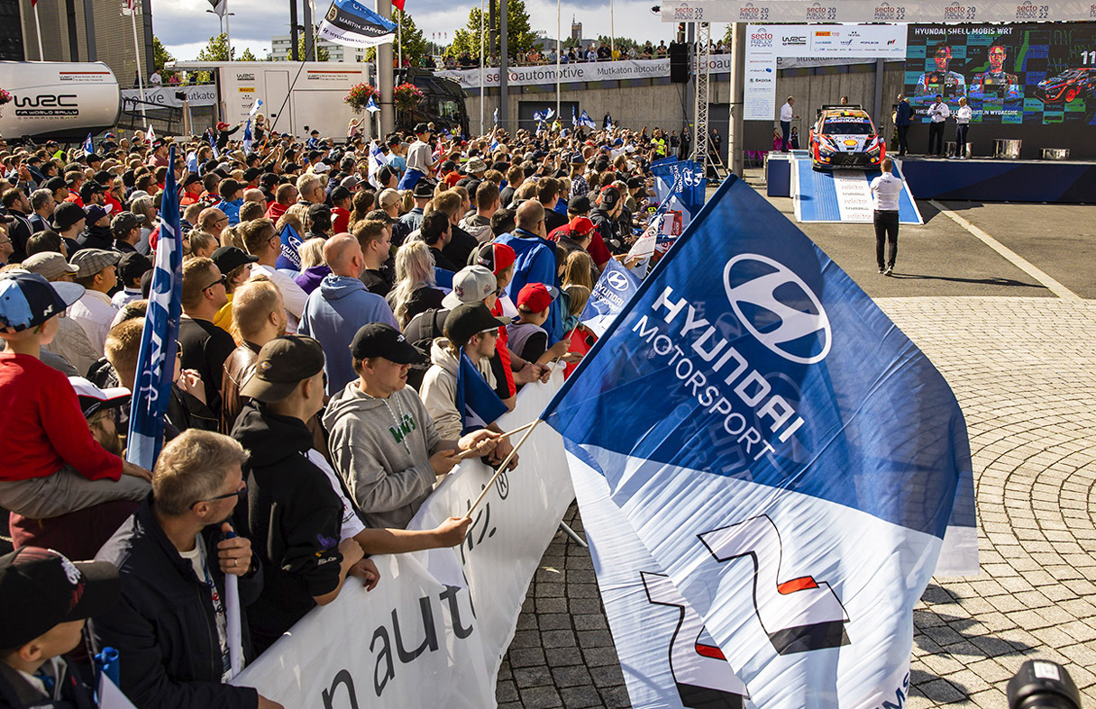Rally fans at the WRC stadium for the 2022 season cheering for the Hyundai Motorsport team