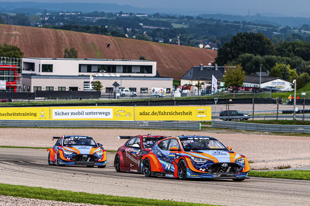 The Veloster N ETCR in motion at the ETCR, an electric touring car race