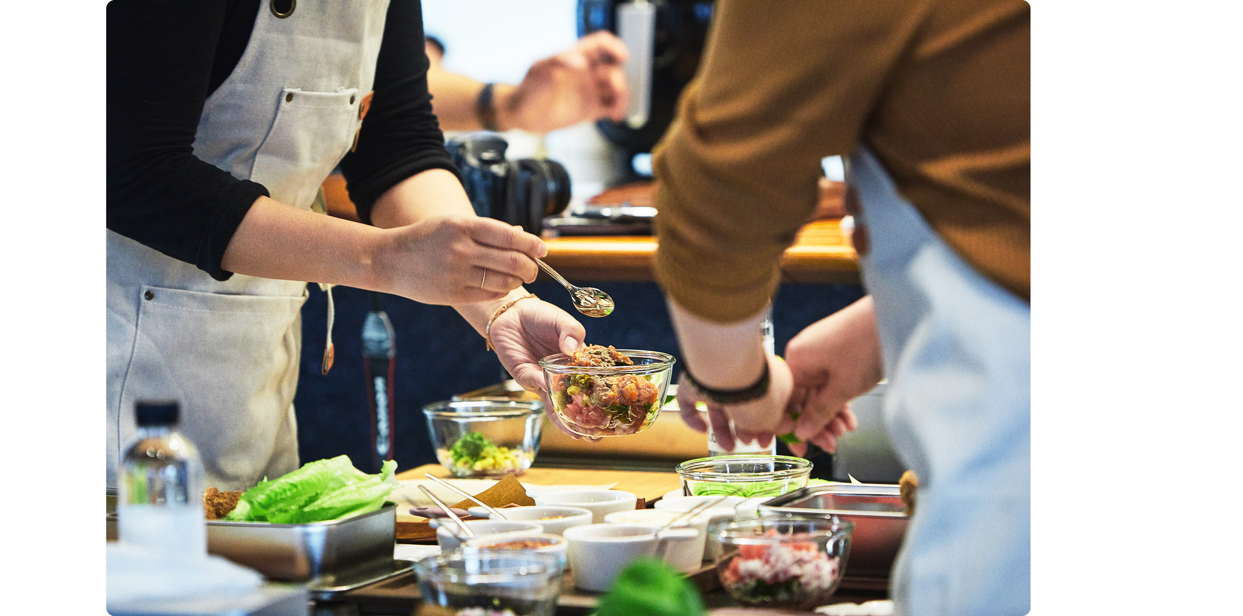 A vegan cooking class, a vegetarian table setting, in progress