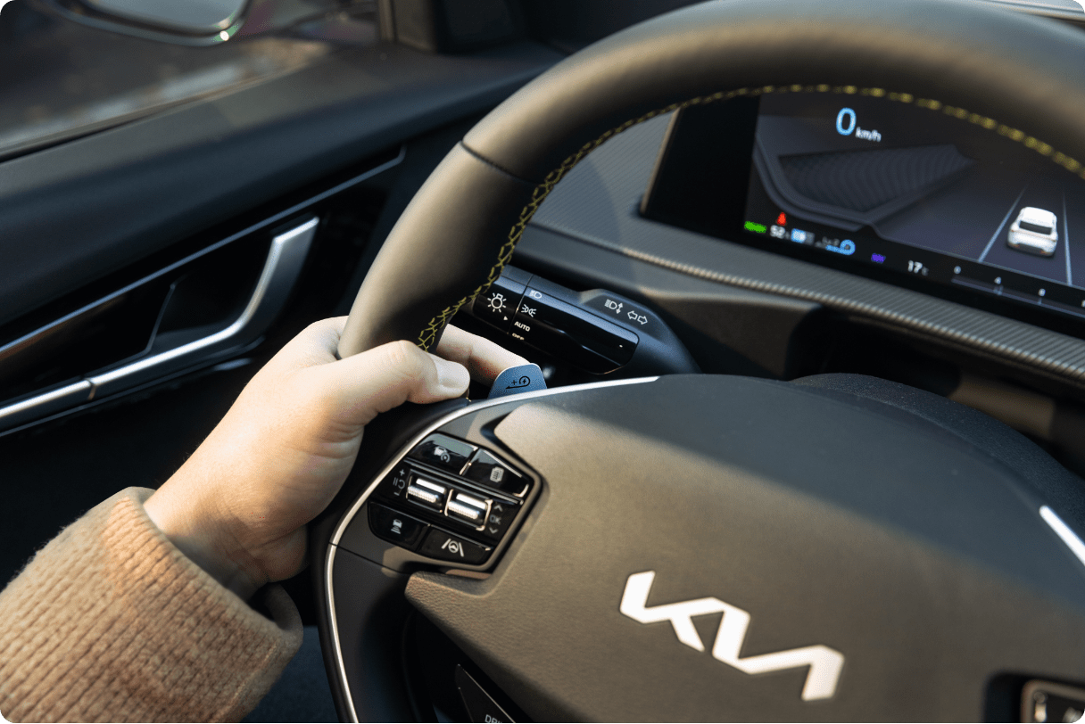 Manipulating the paddle shift that can adjust the amount of regenerative braking of the Kia EV6 GT