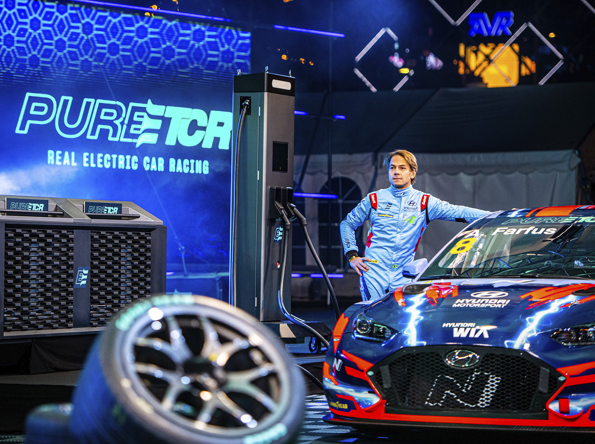 A Veloster race car and a Hyundai driver
