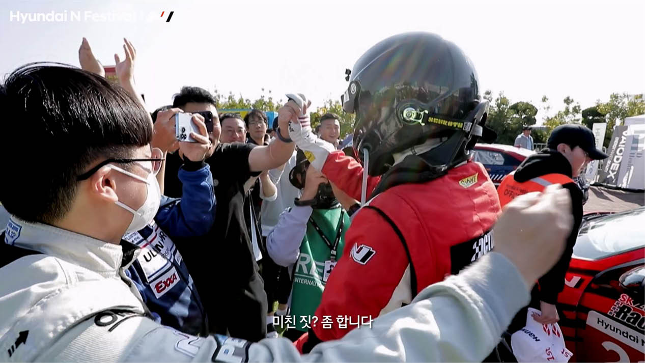 A racer with fans