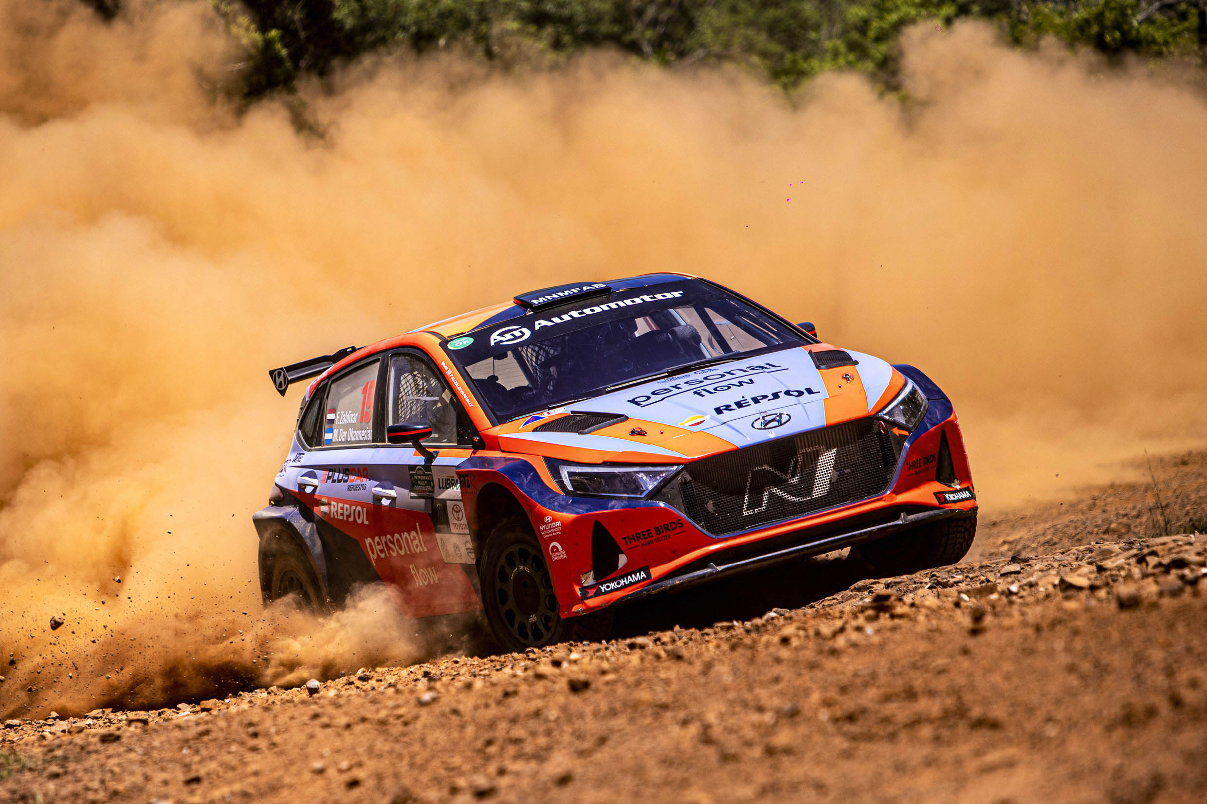 Hyundai's Rally 2 race car running on a dirt road