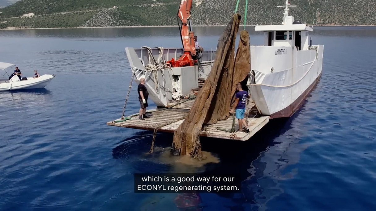A scene from a documentary where a giant marine debris is being pulled out.
