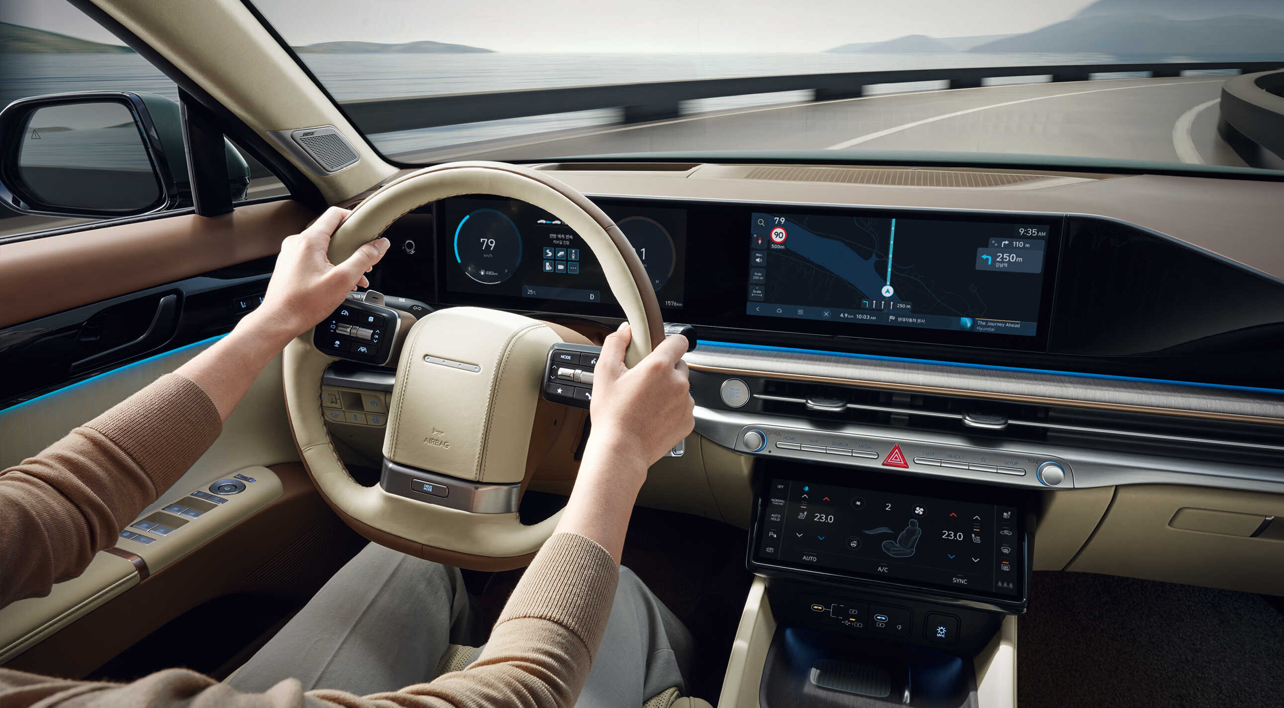 The interior of The All New Grandeur driving