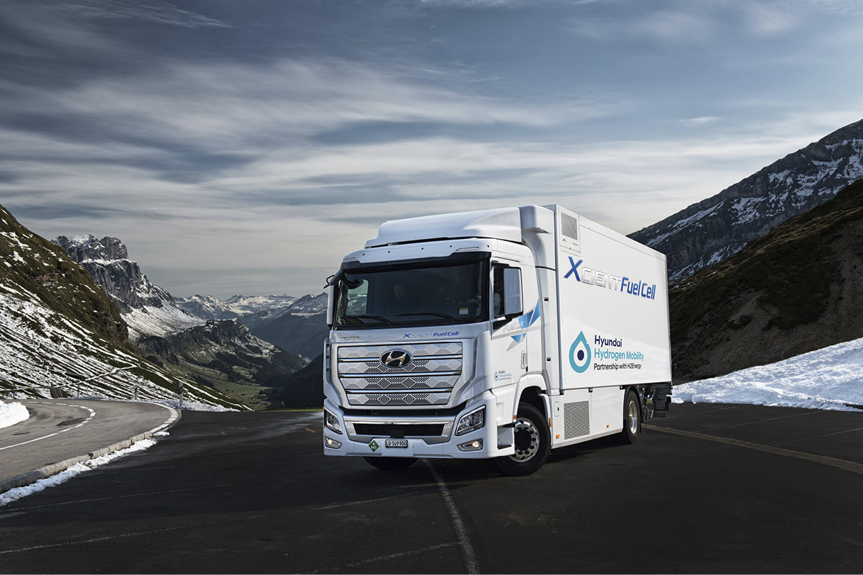 Xcient FCEV, located on the road in the Swiss mountains
