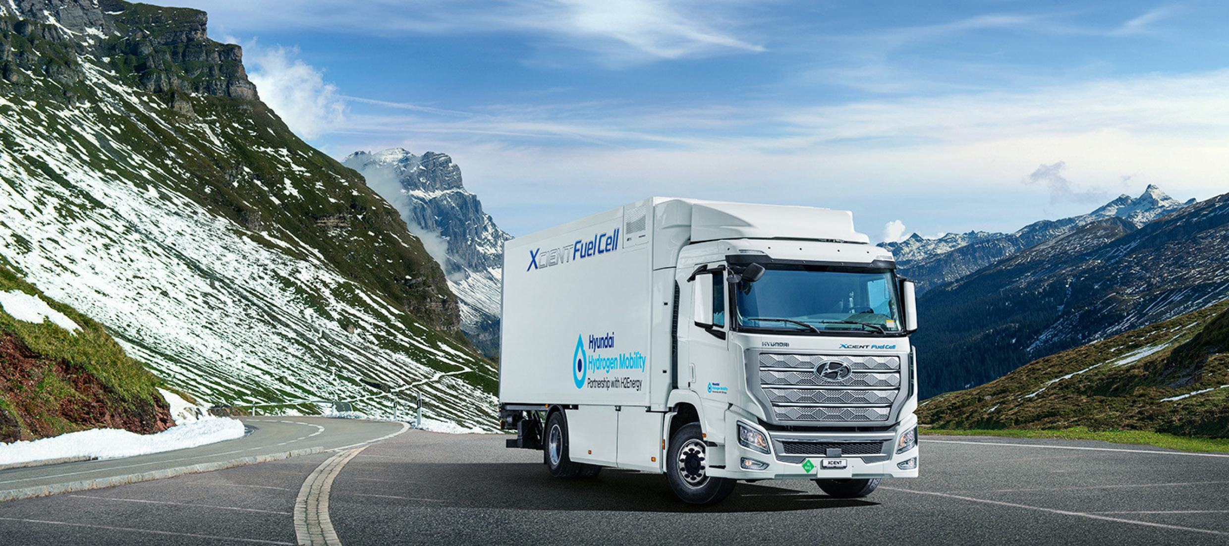 Xcient FCEV, located on the road in the Swiss mountains