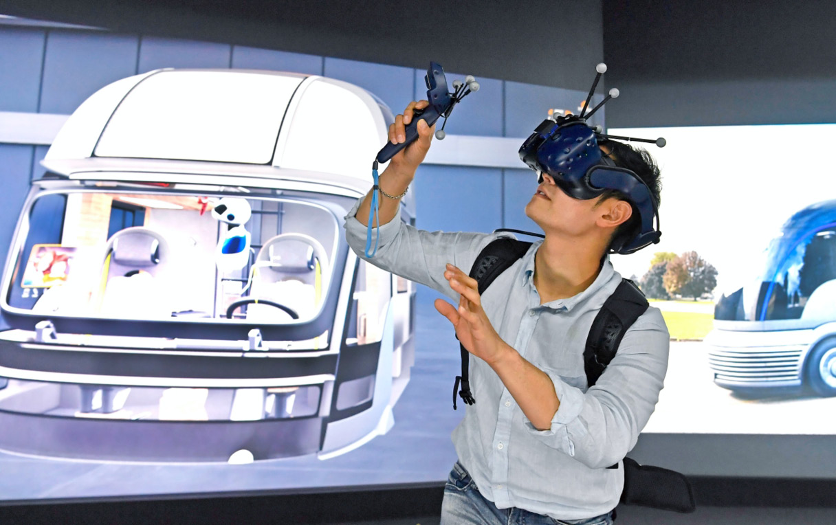 A man is experiencing a VR design evaluation program