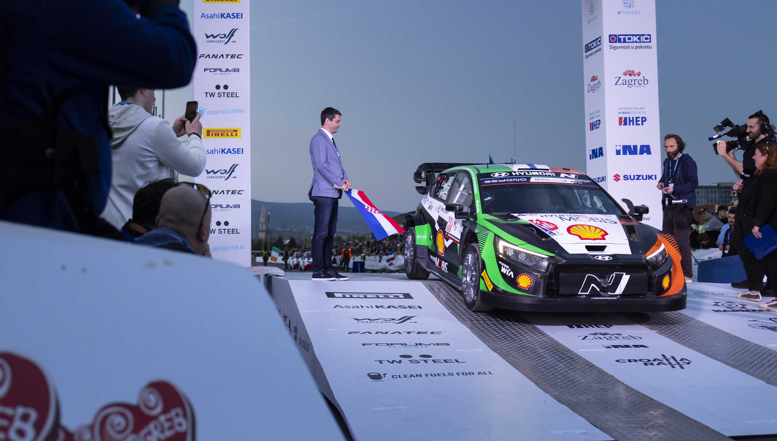 Rally car of Hyundai Motorsport Team with livery in Irish flag colors