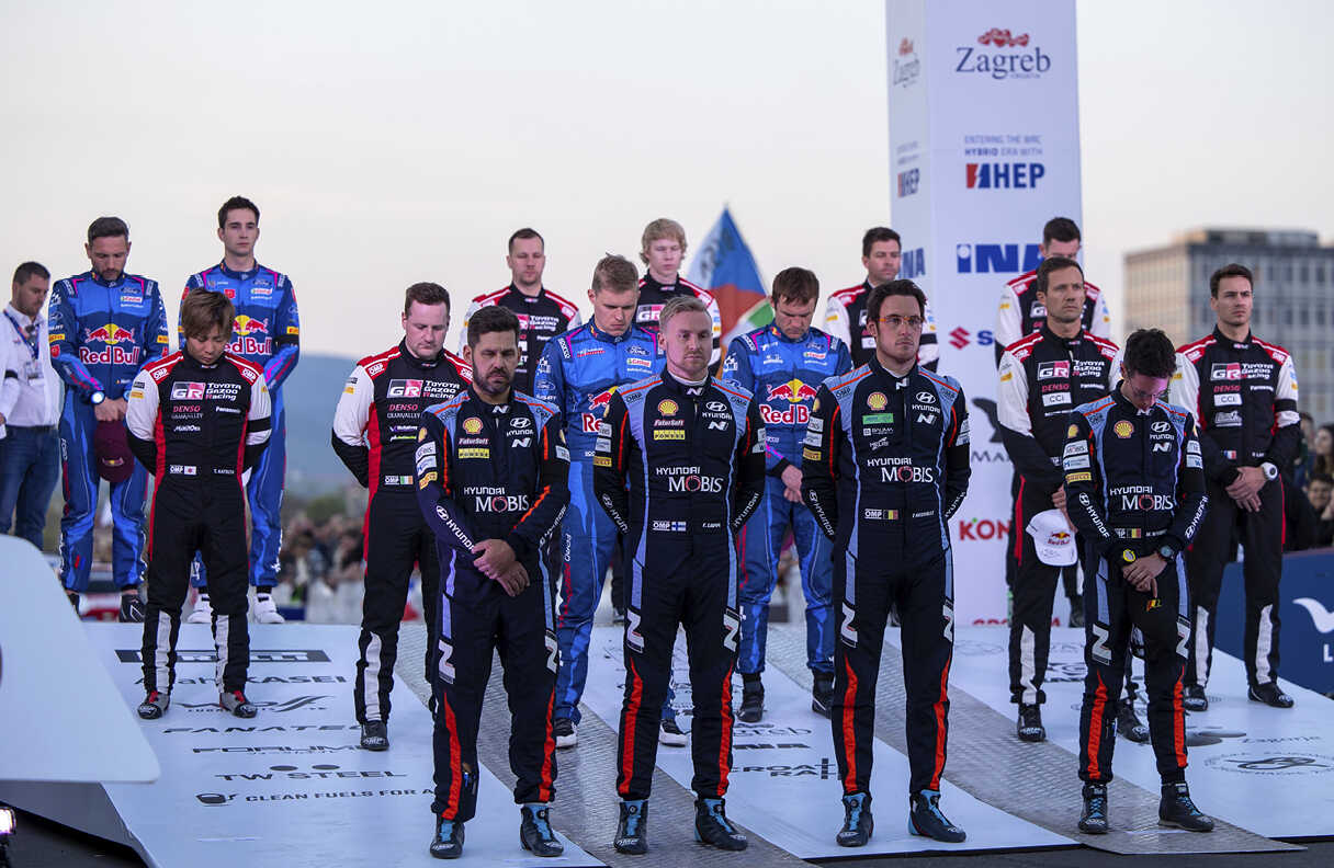 Drivers honoring Craig Breen before entering the race