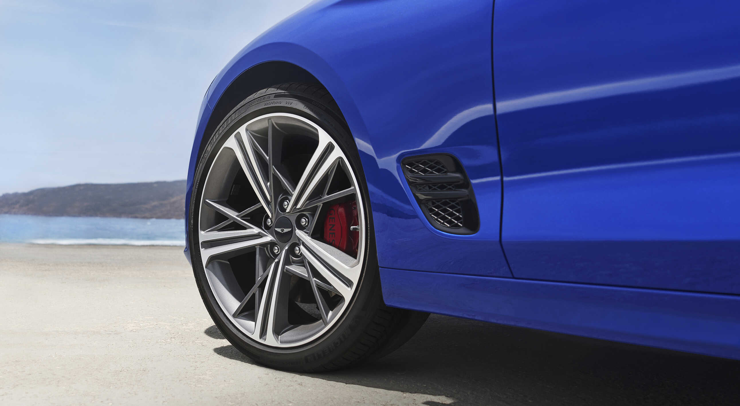 A close-up of the wheels of the Genesis G70