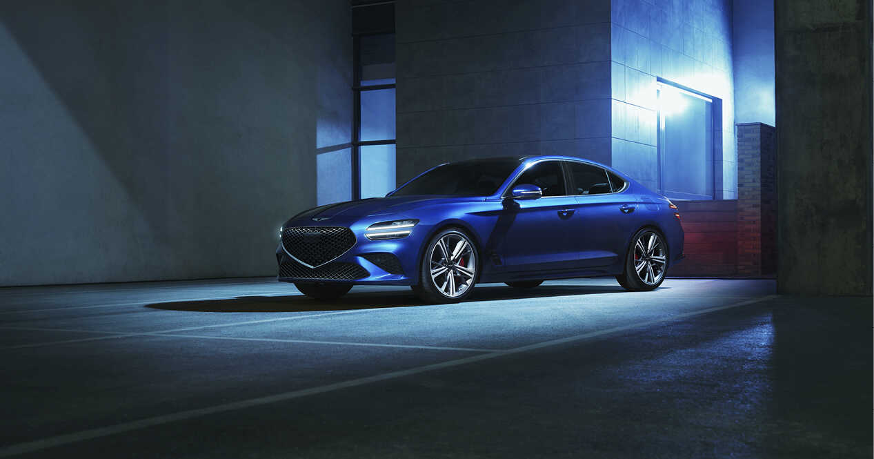 The Genesis G70 is standing in a parking lot