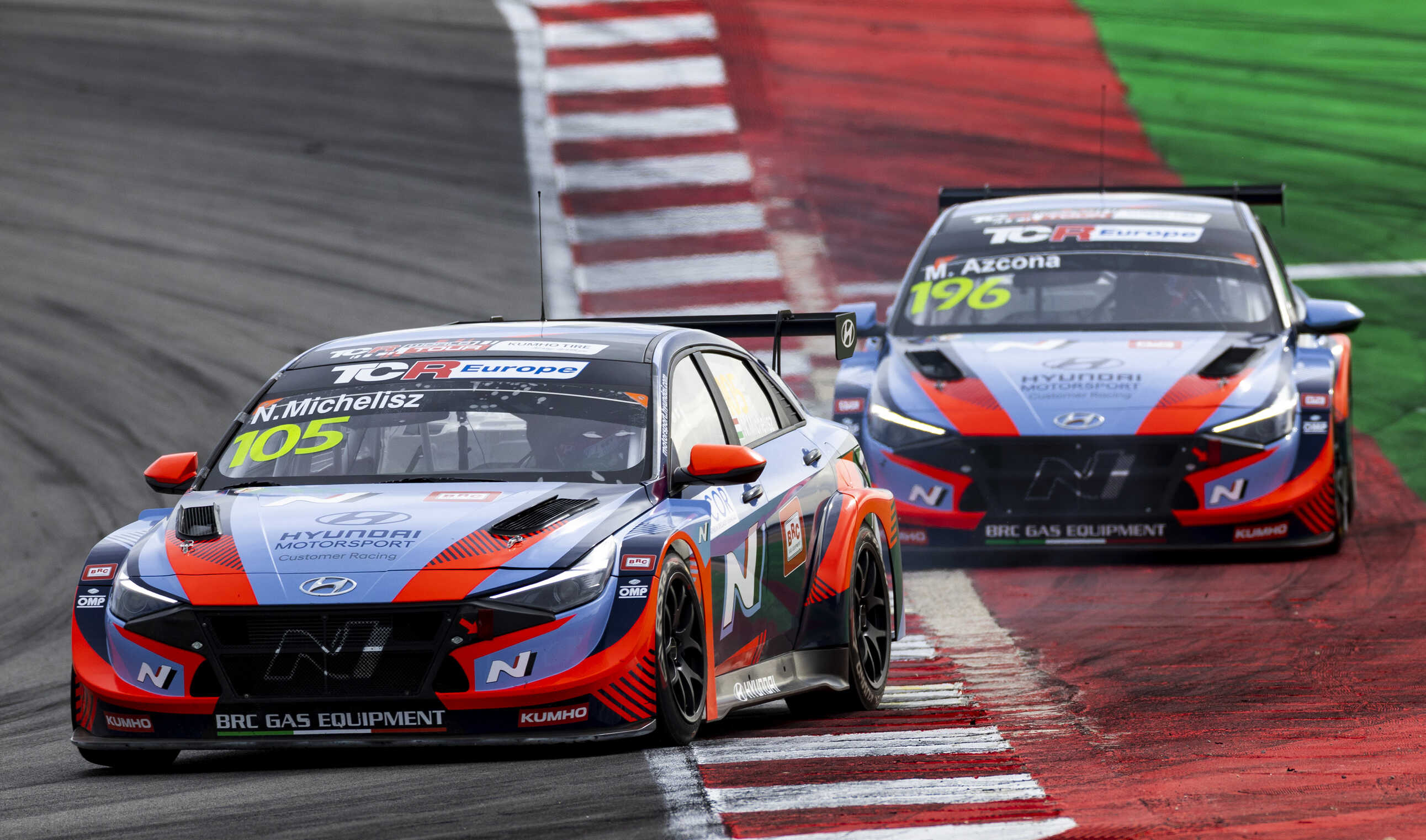 The race cars of the BRC Hyundai team are running in a row