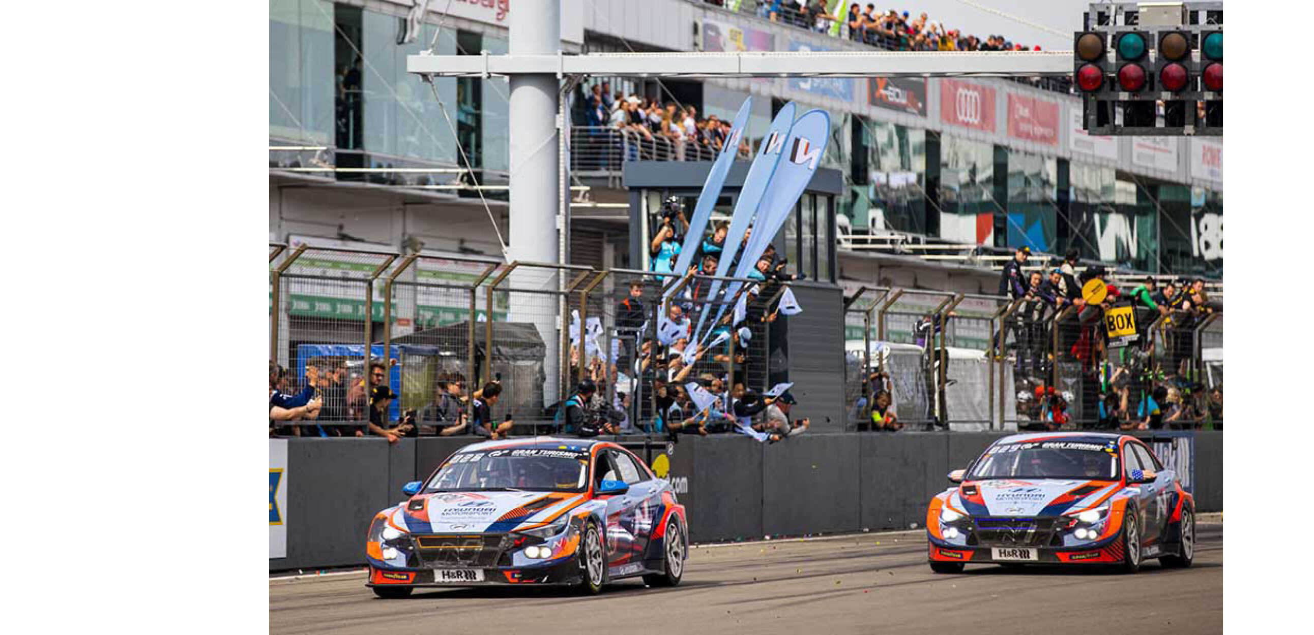 TCR racing cars are running on the circuit