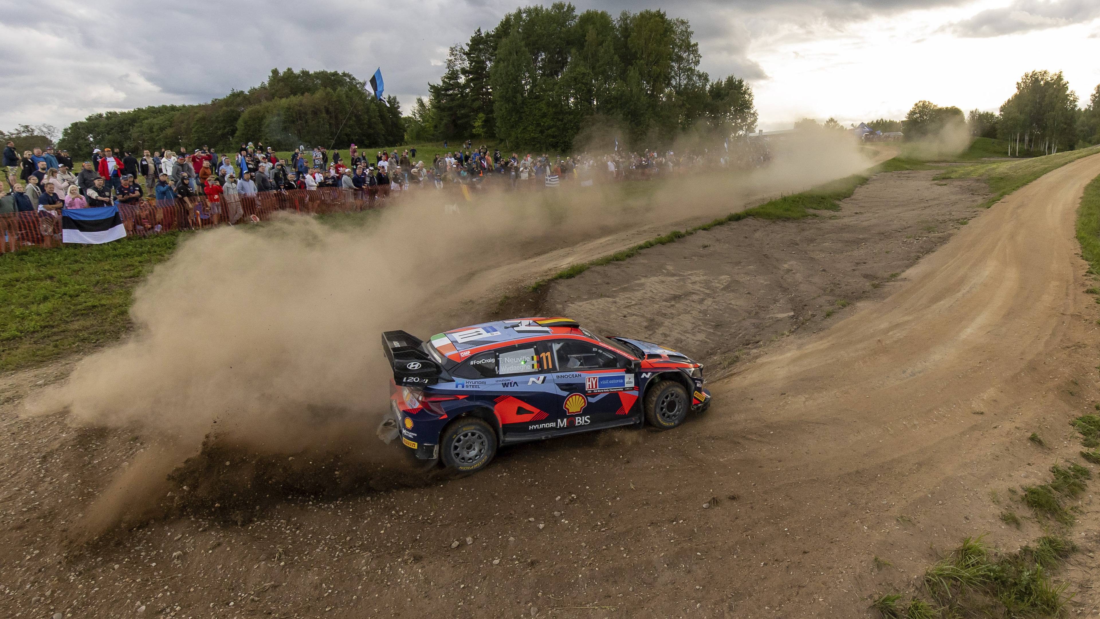 A rally car exiting a corner