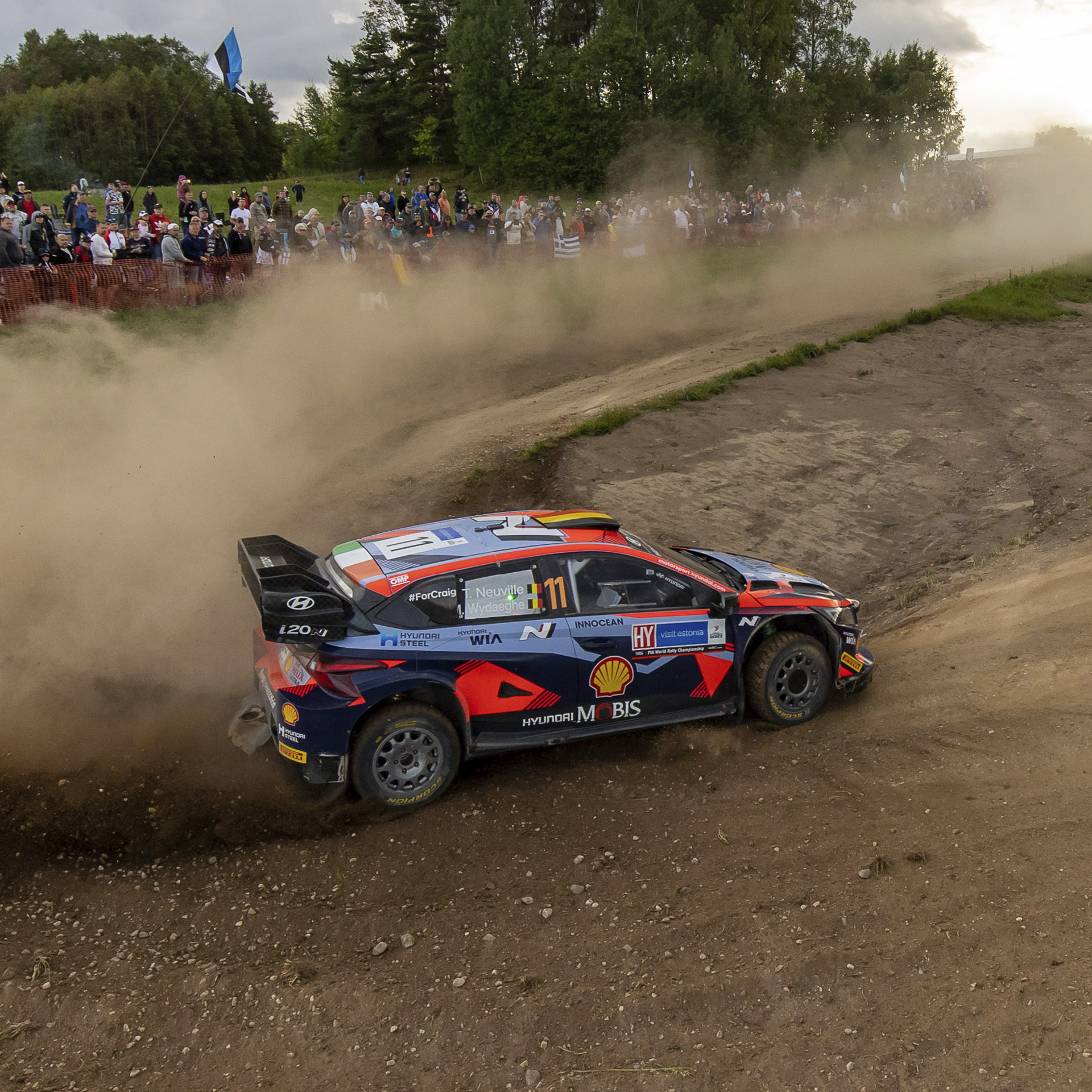 A rally car exiting a corner