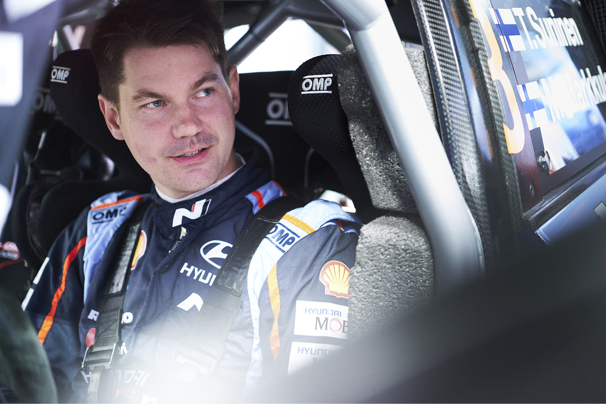 Teemu Suninen sits in a rally car