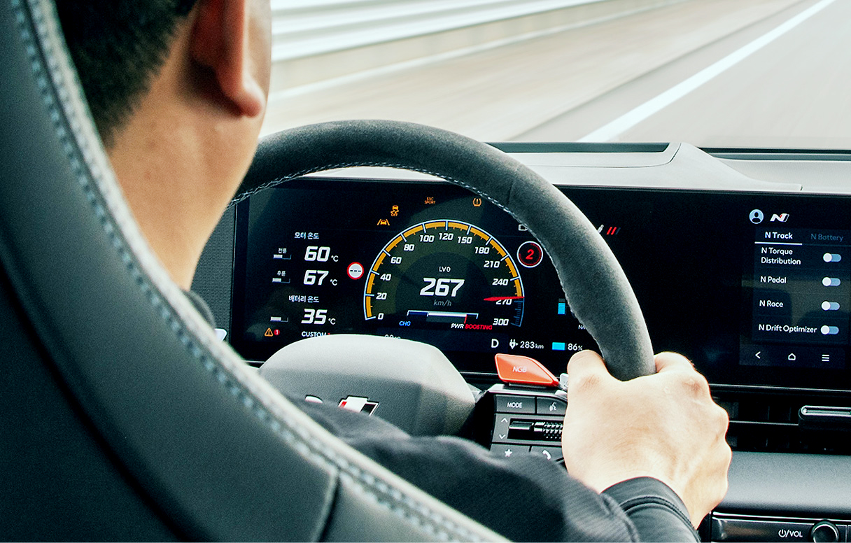 IONIQ 5 N driver driving fast on a straight road