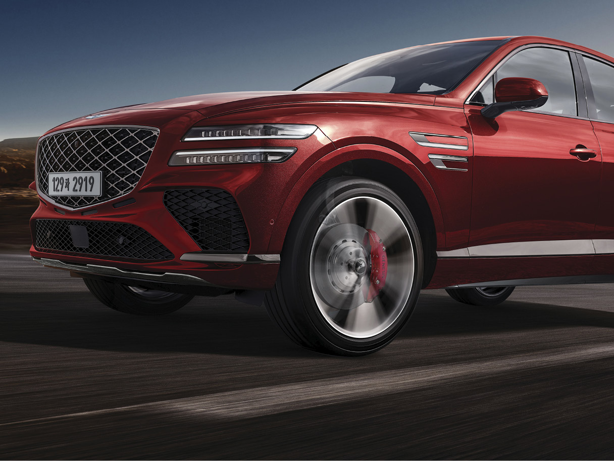 GV80 브레이크 시스템을 강조한 전측면 모습