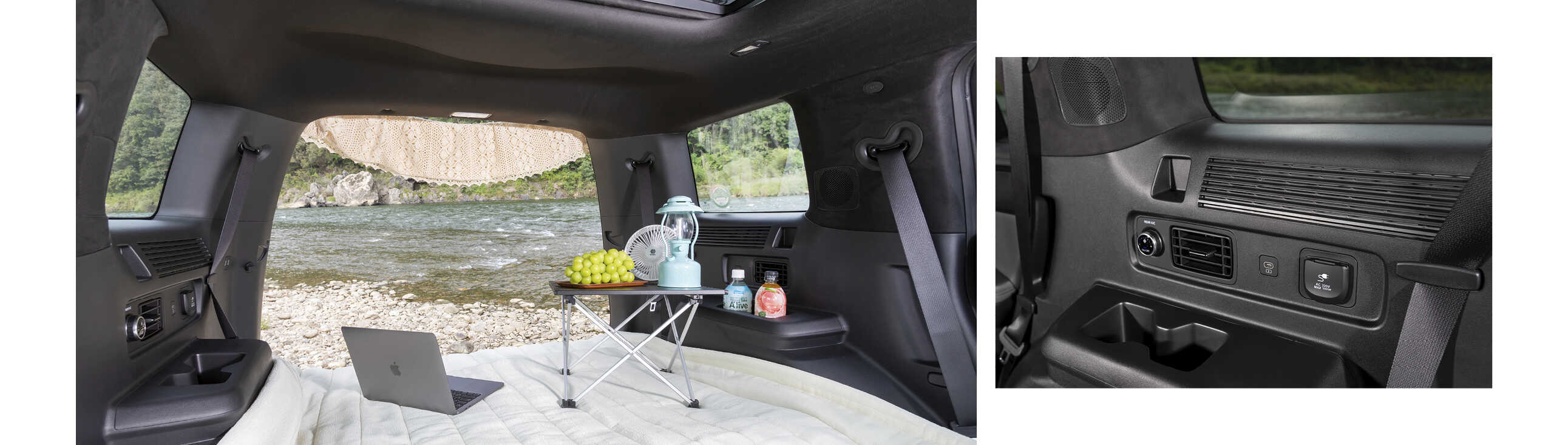 Interior view with bedding, laptop, and table set up for car camping