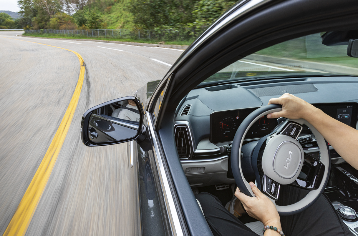 A person driving the New Sorento