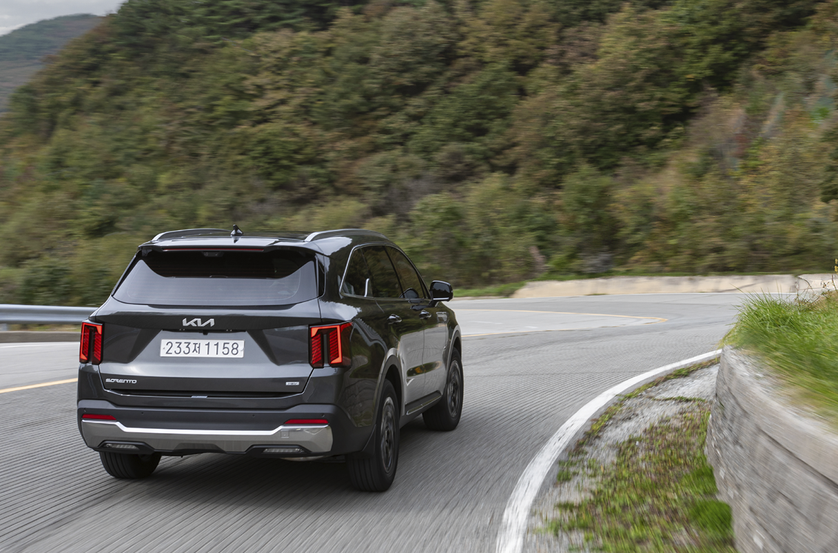 The back view of The New Sorento while driving