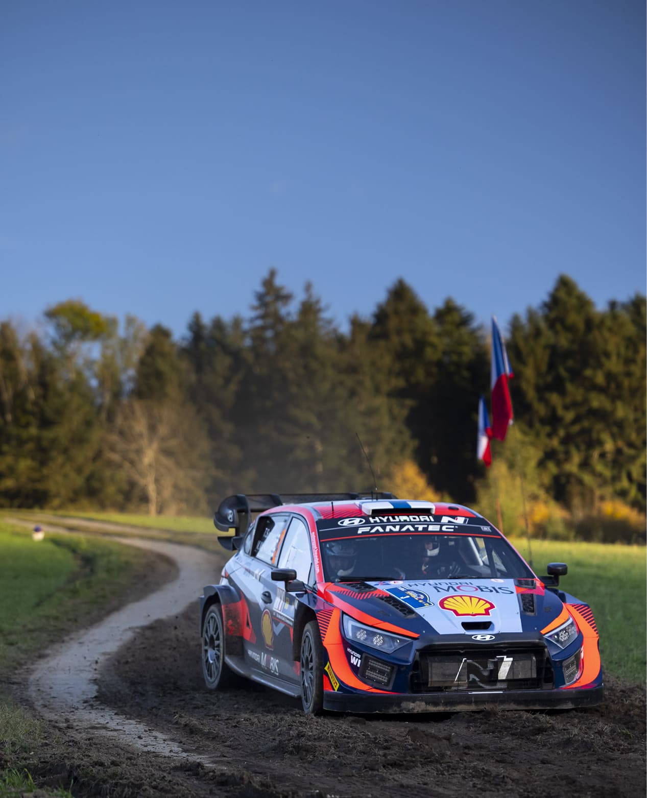 A rally car running on a rough road