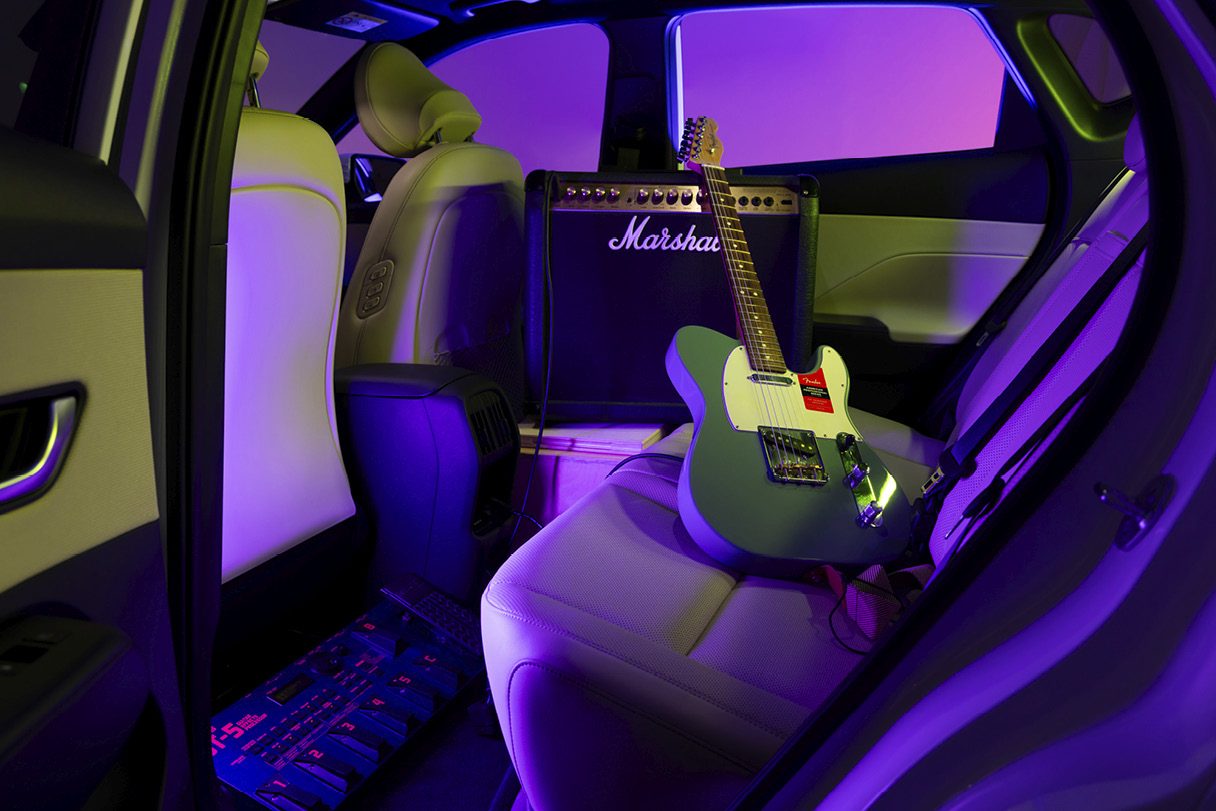 Guitar placed in the second row of Kona Electric