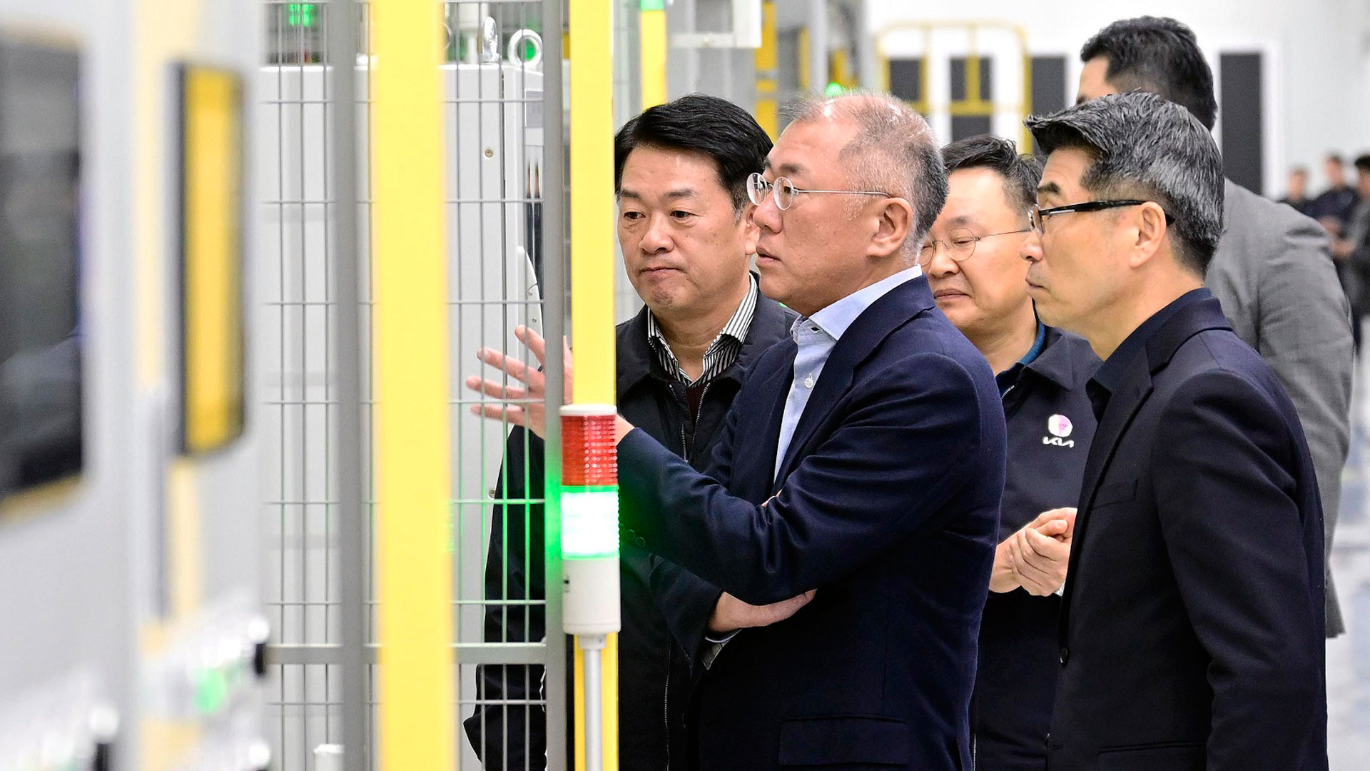 Hyundai Motor Group Executive Chair Euisun Chung looks around Kia AutoLand Gwangmyeong and encourages the employees