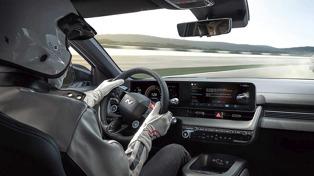 A driver being tested at a driving test site