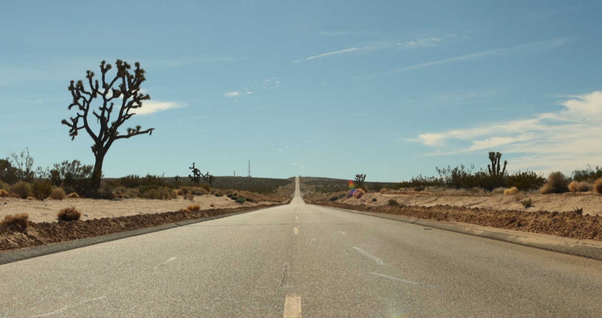 Bright sunlight and a road at the driving test site