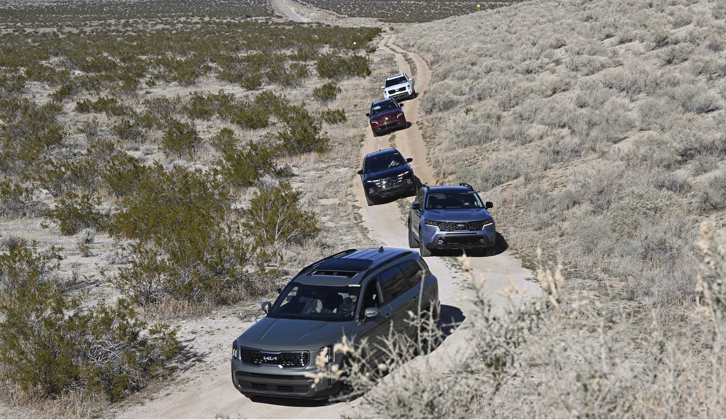 Several vehicles being tested at the proving ground