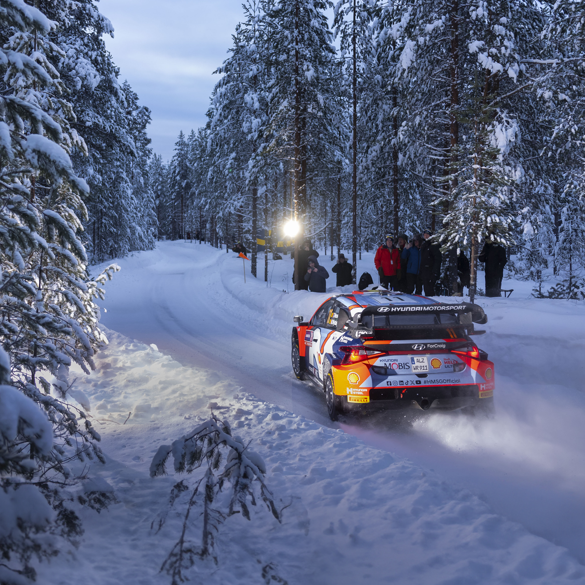 Rally car running on snow