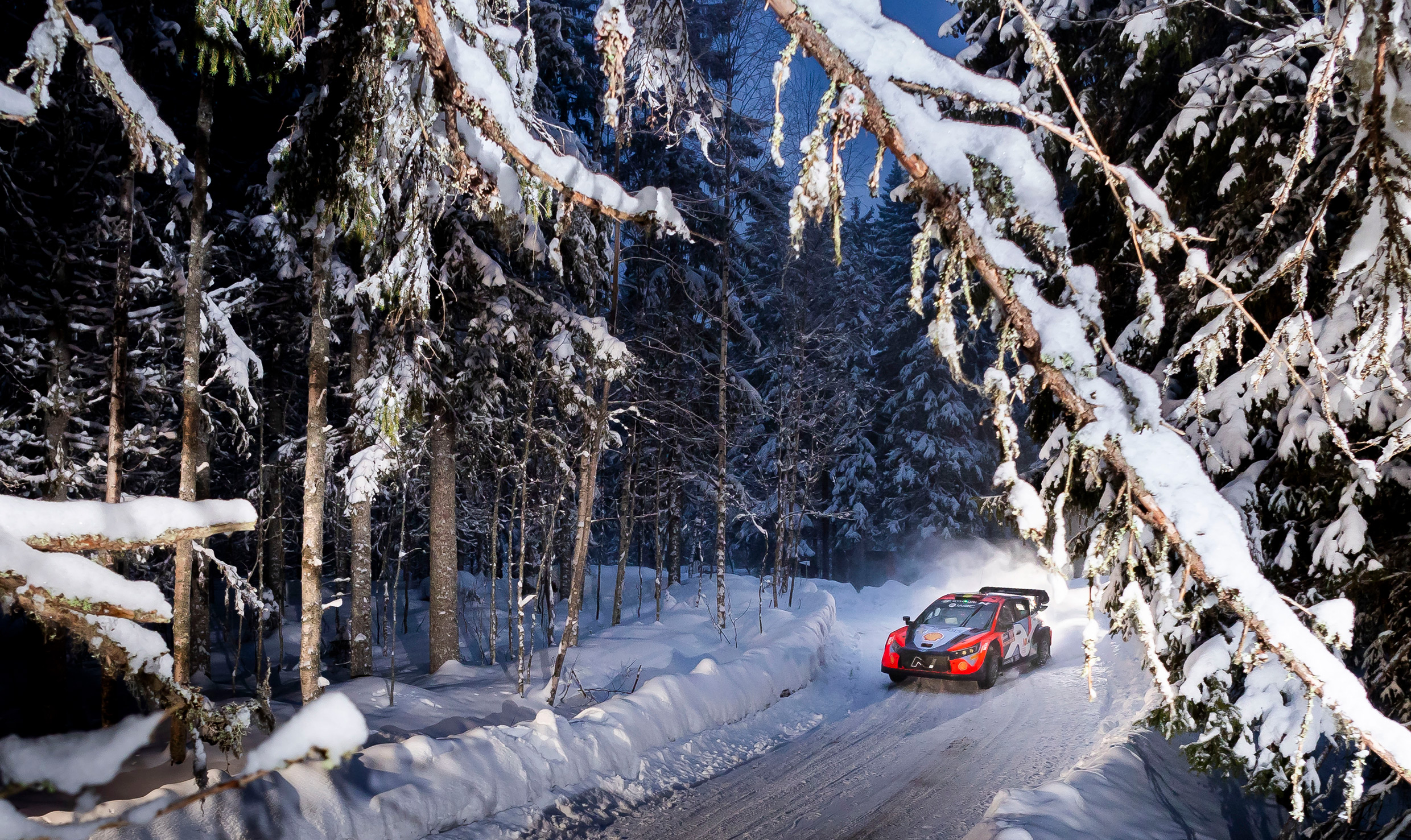 Rally car running on snow