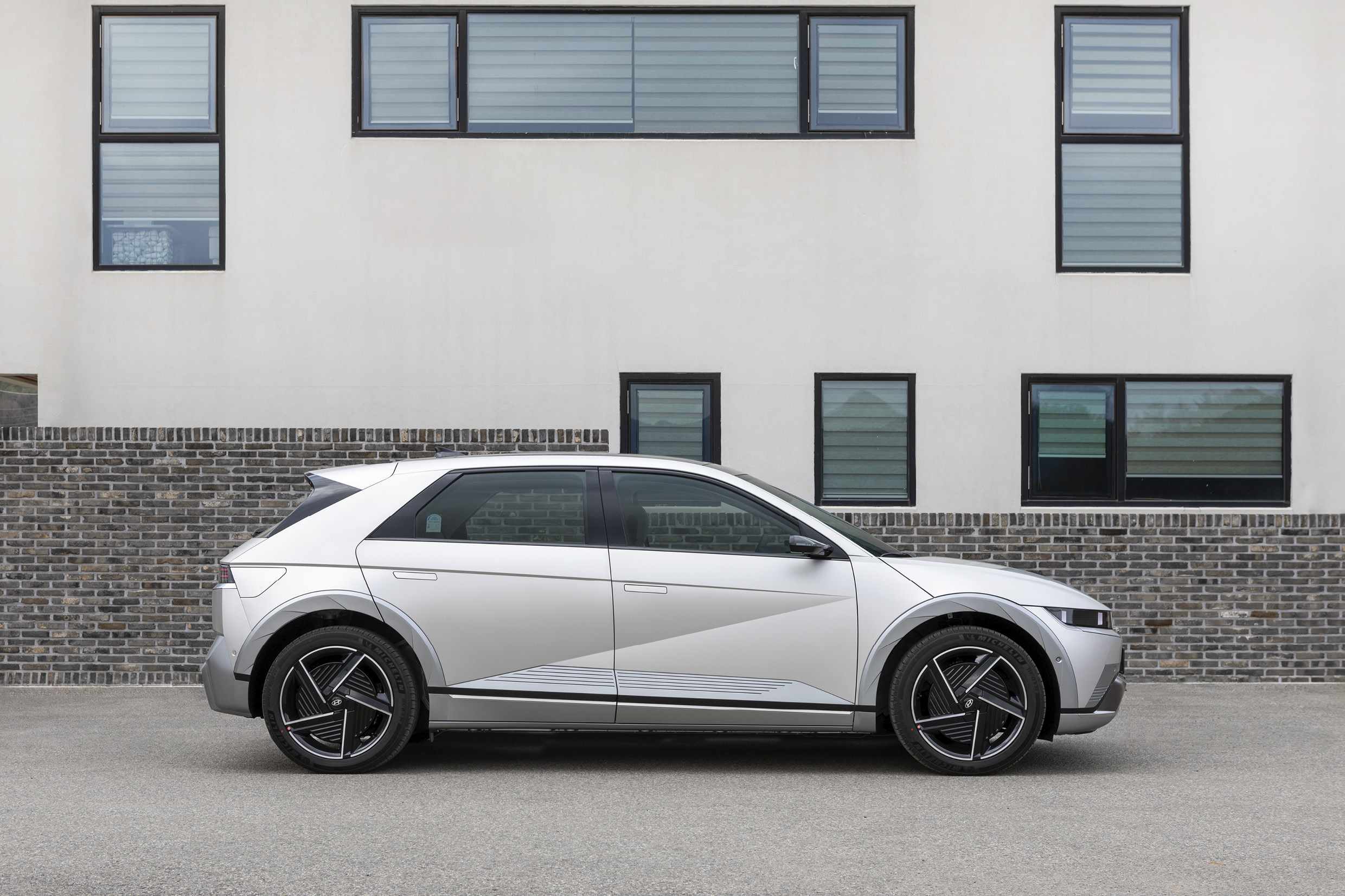 The New Ioniq 5 is standing on road