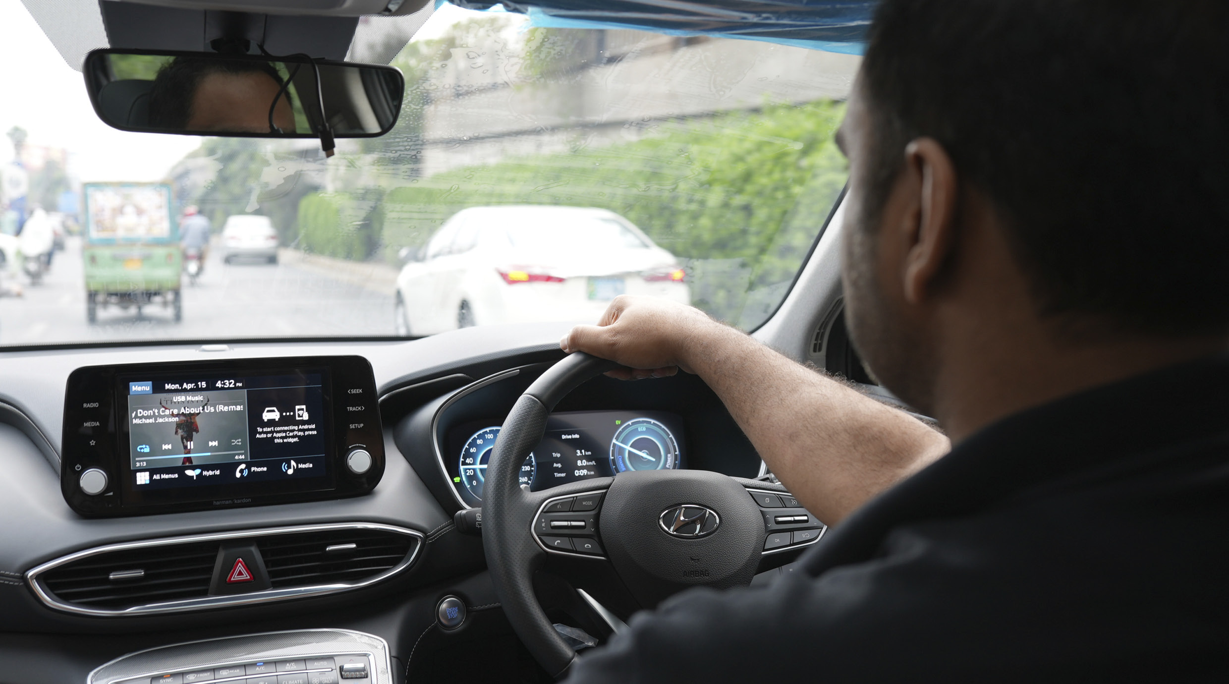 A local customer driving with nano cooling film attached