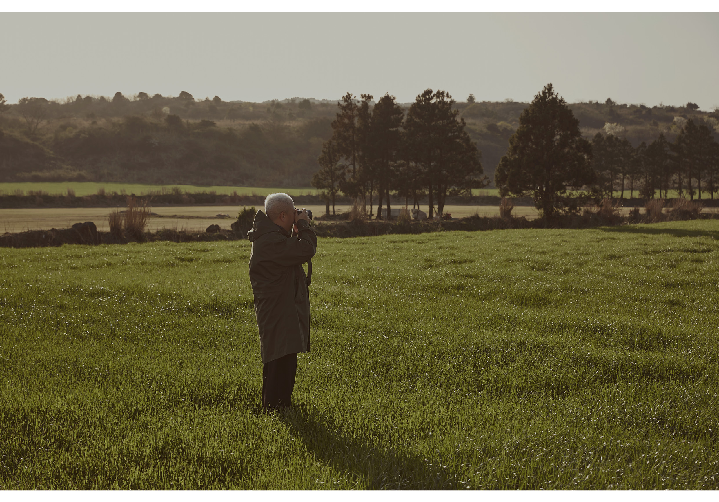 a photographer filming nature